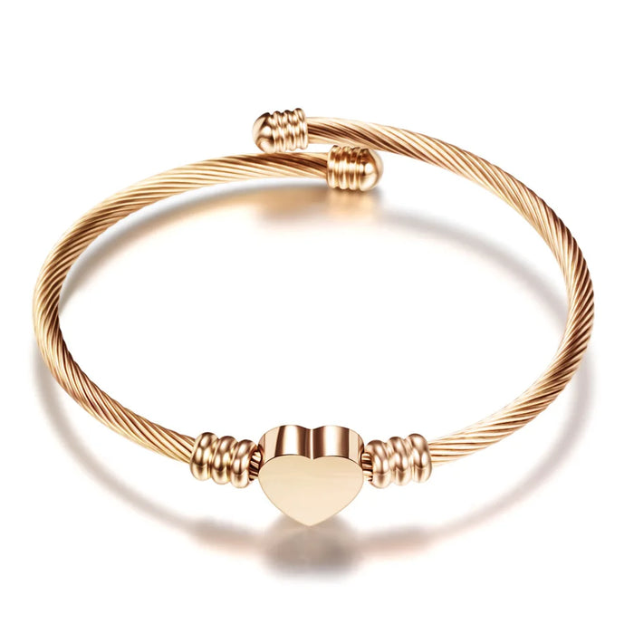 Flexibles Armband mit Herz-Detail in Gold
